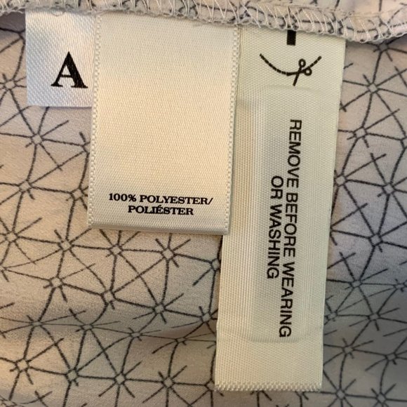 Intercontinental Apparel Inc Ivory and Black Blouse - Picture 11 of 16